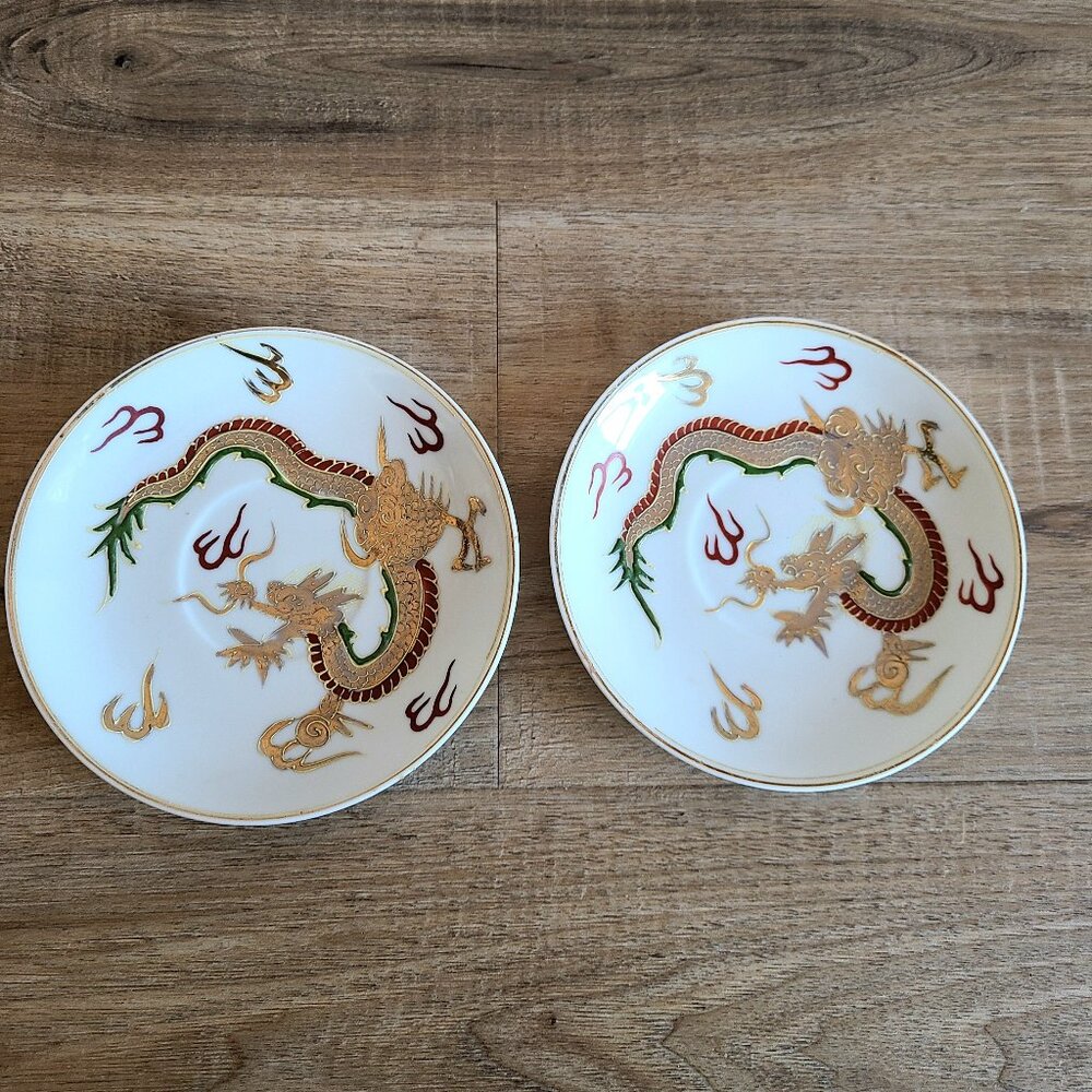 Set of 2 1940s Dragonware Kutani porcelain saucers with dragons design.